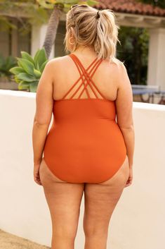 Throw on this fab swimmie and meet us at the lake! This cutie has an always fashionable burnt orange color and three strand straps that cross over in the back for a super chic look! The slightly ruched sides are so stylish and the one piece style is so flattering! Style it with a cute kimono for an amazing swim look! 82% Polyamide, 18% Elasthane Summer Swimwear With Solid Color And Crisscross Straps, Solid Summer Swimwear With Crisscross Straps, Solid Color Crisscross Swimwear For The Beach, Solid Color Crisscross Swimwear For Beach, Orange Swimwear With Adjustable Straps, Solid Color Crisscross Beachwear Swimwear, Orange Swimwear With Adjustable Straps For Pool, Beachwear Swimwear With Wrap-around Strappy Back, Summer Swimwear With Adjustable Crisscross Straps