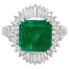 This exquisite 3.32 Carat Emerald is truly a captivating gemstone. Mined from the renowned Columbian emerald mines, this gem showcases the superior quality and rich green hue that Columbian emeralds are renowned for. The vibrant color of this emerald is reminiscent of lush forests, exuding a sense of natural beauty and luxury. Set in a finely crafted Platinum mounting, this emerald is enhanced by its elegant and timeless setting. The sleek and durable platinum not only complements the emerald's vibrant green color but also provides a secure and long-lasting foundation for this precious gemstone. With its impressive carat weight of 3.32, this emerald is a show-stopping centerpiece that will undoubtedly make a statement. Its size allows for the intricate facets of the emerald to reflect ligh Platinum Diamond Rings, Emerald Diamond Ring, Etsy Gold Ring, White Gold Diamond Rings, Emerald Gemstone, White Gold Ring, Green Emerald, Gold Diamond Rings, Natural Emerald