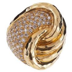 Henry Dunay ring composed of 18K yellow gold with pavé round brilliant-cut diamonds. The ring features a hammered finish. There are 99 round brilliant-cut diamonds that total 2.22 carats, F-G color and VVS-VS clarity. The ring is a size 6 1/2. Square Diamond Rings, Tanzanite Diamond Ring, Bold Rings, Pave Diamond Ring, Textured Ring, Vs Diamond, Hammered Gold, Domed Ring, Gold Diamond Rings