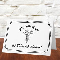 a card that says, will you be my matron of honor?