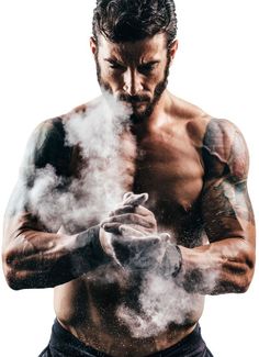 a shirtless man is holding his hands in front of the camera with steam coming out of it