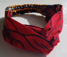 This listing is for Ankara Headbands with a twisted design form. Available in different Ankara design.  The Headband is made from 100% African wax cotton. It has elastic at the back, stretching from 54cm to 68cm Handmade Ships worldwide CARE: Wash with mild soap   Do not bleach Feel free to start up an etsy conversation if you have any questions concerning this outfit Thanks for visiting Handmade Adjustable Band Headband, Handmade Adjustable Headband, Adjustable Traditional Hair Accessories For Gifts, Traditional Adjustable Hair Accessories For Gift, Traditional Adjustable Hair Accessories As Gift, Handmade Adjustable Turban Headband, Adjustable Band Headband As Gift, Handmade Adjustable Headwrap Gift, Adjustable Turban With Matching Headband As Gift