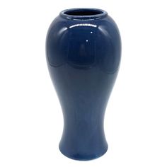 a blue vase is shown against a white background