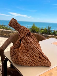 Beige Straw Bag, Raffia Beach Bag, Handmade Summer Bag, Straw Knot Bag, Raffia Knot Bag, Luxury Bag, Crochet Beach Bag, Woven Raffia Bag, - Etsy Ukraine Chic Natural Hobo Bag For Beach, Chic Woven Hobo Bag For Beach, Natural Pouch Hobo Bag For Vacation, Chic Brown Hobo Bag For Beach, Beach Crochet Bag With Braided Handles In Brown, Natural Handwoven Hobo Bag For The Beach, Brown Crochet Bag With Braided Handles For Beach, Summer Beach Style Hobo Bag, Woven Pouch Bucket Bag For Beach