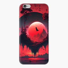 a phone case with an image of a bird flying in front of a red sunset