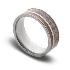 a wedding band with wood inlays on the side and silver inlaying