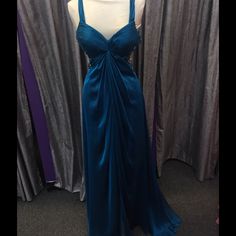 Blue Chiffon With Side Cut Out Gown Blue Chiffon Gown With Sweep Train, Blue Chiffon Prom Gown, Blue Chiffon Gown For Prom Season, Blue Chiffon Gown For Prom, Elegant Sleeveless Chiffon Dress With Sweep Train, Party Chiffon Dress With Pleated Bodice, Flowy Pre-draped Evening Dress For Party, Chiffon Floor-length Formal Gown, Chiffon Floor-length Gown For Formal Events