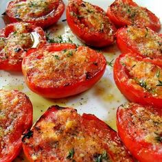 some tomatoes that are sitting on a table