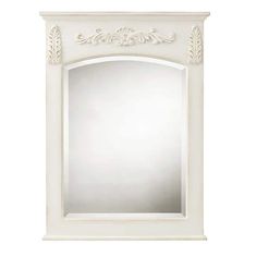 a white mirror with an ornate design on the front and back side, against a white background