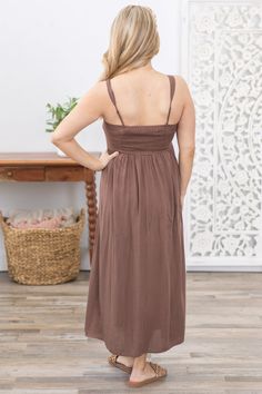 Product Details Colors: Dark Taupe Print: Solid Neckline: Square Neck Sleeve: Sleeveless Hemline: Straight Brand: Be Cool Material and Care Self: 100% Rayon Lining: 100% Polyester Hand Wash Cold Hang/Line Dry Size and Fit Adjustable Straps Small: Bust 28" Waist 27" Length 51" Medium: Bust 30" Waist 29" Length 51.5" Large: Bust 32" Waist 31" Length 52" Photo model is 5'4 and wearing a size medium Video model is 5’8 and wearing size small Dark Taupe, Photo Model, Be Cool, Large Bust, Small Bust, Square Neck, Smocking, Adjustable Straps, Hand Wash