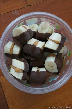 chocolate dipped almond butter banana bites on a plate