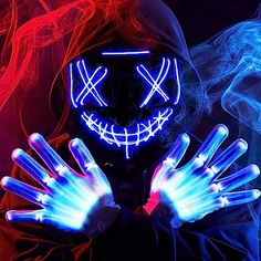 Value Set. The package includes 1 Halloween Themed LED face Mask and a pair of LED gloves in blue color, making your Halloween party glow in the dark. Very Comfortable. Our Scary Halloween Glow Up Mask is Suitable for Most… Led Gloves, Mask Light, Mascaras Halloween, Led Face Mask, Led Mask, Birthday Party Activities, Vintage Halloween Decorations