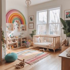 a child's room with lots of toys and decor on the walls, including a crib