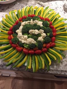 vegetables arranged in the shape of a sunflower