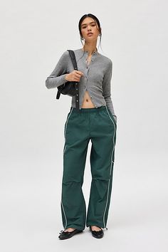 Effortless track pants from BDG. Our BDG Jess nylon track pants have an easy fit with a low rise and a relaxed straight leg. Essential track pants styling with contrasting piping at the sides. Find these staple track pants only at Urban Outfitters. Features BDG Jess nylon track pants Wide leg track pant Mid rise elasticated waistband Side pockets Piping down the legs Relaxed, straight-leg fit Full length Pull-on style UO exclusive Content + Care 100% Nylon Machine wash Imported Size + Fit Model Straight Leg Track Pants, Green Adidas Track Pants, Nylon Track Pants, Track Pants Outfit, Adidas Track Pants, Green Fits, Track Pant, Birthday List, Green Pants