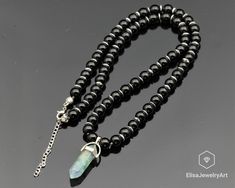 Pointed Fluorite Pendant Natural Black Onyx Gemstone Stone Clasp Closure Necklace Black Men's Necklace Gift For Him Unisex Necklace Free fast shipping 3-5 business days delivered to the purchaser all necklaces -ALL THE PRODUCTS AT ELISAJEWELRYART ARE HANDMADE AND MADE WITH NATURAL BEADS. -WHAT DOES THE FLUORITE STAND FOR Fluorite is multi-colored mineral known for its powerful energetic healing properties and mesmerising physical beauty. Known for its ability to absorb negative energy and transm Black Crystal Pendant Necklace With Gemstone Beads, Cardboard Jewelry Boxes, Physical Beauty, Unisex Necklace, Protection Stones, Onyx Gemstone, Onyx Bead, Necklace Black, Men's Necklace