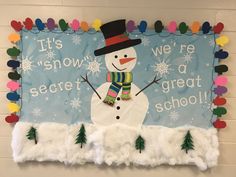 a bulletin board with a snowman on it