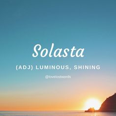 the words solasta ad luminous, shining in front of an ocean sunset