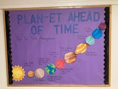 a bulletin board with the planets labeled on it