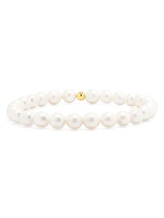 A new take on our classic everyday stretch bracelet. This bracelet is made with 5.8mm freshwater pearls and a single 4mm gold fill bead. It's always a party on your wrist when you add these leMel gold fill stretch beaded bracelets to your wrist stack! Perfect to wear alone or with your other leMel favorites! Measure 6.5" in length. E-mail us for a custom size. Please allow 1-2 weeks for delivery. Everyday Stackable Pearl Bracelet, Stretch Bracelet With Pearl Charm And Round Beads, Classic Single Strand Beaded Bracelet For Gift, Classic Single Strand Beaded Bracelet As Gift, Classic Single Strand Beaded Bracelets As Gift, Elegant Hand-strung Rondelle Pearl Bracelet, Elegant Everyday Pearl Stretch Bracelet, White Classic Beaded Bracelets For Everyday, Classic White Bracelets For Everyday