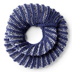 a blue and white knitted scrunffle on a white background