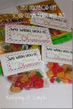 four bags of gummy bears with the words, easy neighbor gift for sour gummy bears