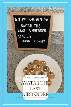 some cookies are on a plate with the words now showing avatar the last airbender serving cookies