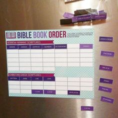 a stainless steel refrigerator with a bible book order sign on the door and magnets attached to it