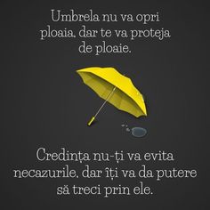 a yellow umbrella sitting on top of a black background