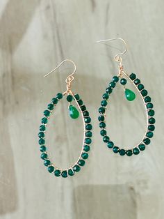 3" teardrop shaped hoop earrings featuring hand wire wrapped aventurine and a jade drop.  The hoop earring frames are made of 14k gold filled wire and are shaped like teardrops. I hand wire wrapped aventurine all around the hoops. The stones are 4mm, faceted and round. I placed a smooth jade drop in the center of each hoop.  These earrings are 100% handmade and all the gold is 14k gold filled, including the earwires.  The earrings are really light and comfortable. The Kelly green color pops! Teardrop Wire Wrapped Earrings, Wire Wrapped Teardrop Earrings, Teardrop Wire Wrapped 14k Gold Filled Hoop Earrings, Teardrop 14k Gold Filled Wire Wrapped Hoop Earrings, Handmade Hoop Jade Jewelry, Green Wire Wrapped Dangle Hoop Earrings, Handmade 14k Gold-filled Teardrop Earrings, Bohemian Jade Wire Wrapped Earrings, Green Gemstone Dangle Hoop Earrings