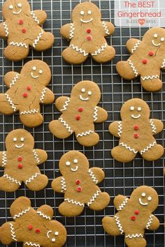 several gingerbreads are arranged on a cooling rack