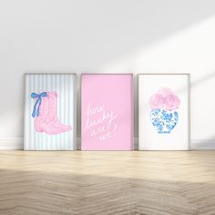 three framed art prints on a wall in a room with wood flooring and white walls