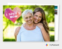 an older woman hugging her younger daughter in front of a heart - shaped i love u mom sign