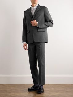 A.P.C. reinterprets classic tailoring through a modernist lens. Darted for a slim fit, this 'Harry' suit jacket is cut from wool and tailored with narrow, high-gorge notch lapels. Wear yours with a crisp white shirt and the matching trousers. Slim Fit Three-piece Suit With Welt Pockets For Office, Tailored Double Breasted Suit With Welt Pockets, Tailored Double Breasted Wool Suit, Tailored Single Breasted Suits For Work, Tailored Wool Three-piece Suit With Suit Collar, Single Breasted Tailored Suits For Office, Modern Fitted Suits For Workwear, Tailored Tweed Jacket With Suit Collar, Slim Fit Single Breasted Blazer In Suiting Fabric