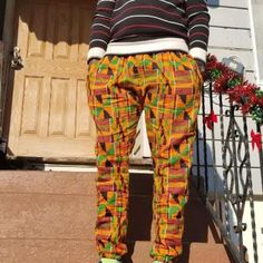 Listed Handmade Kente Pants. Made To Order African Fabric Pants. . Pants Are Very Versatile Can Be Worn Daytime Or Partytime. . Capri/Pants Has 2 Side Pockets And Wallet. Elastic Waist For Comfortable Feel. . Perfect For Daytime Or Evening Events. . Item Can Be Customized. . Plz Contact Us Before Ordering. Camel Coat Outfit Winter Style, Ankara Pants, African Pants, Camel Coat Outfit, Winter Coat Outfits, Minimalist Fashion Women, Tops Trendy, African Clothes, Winter Fashion Boots