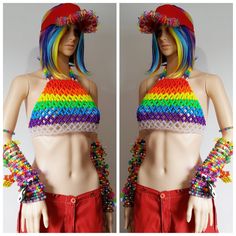 This kandi halter is made with rainbow and clear pony beads. Womens size A-D cup This Item is made to order in your size. Note kandi accessories,visor and pants not included. Perfect for any event! You will get lots of compliments in this unique wearable art! Stand out at your next event! Edm festival Raves Party Rave outfit Festival outfit Pride Mardi gras Rave Crop Top For Music Festival, Rave Festival Stretch Crop Top, Rave Style Stretch Crop Top For Festival, Multicolor Rave Tops For Festival, Rave Style Multicolor Tops For Festivals, Multicolor Rave Festival Tops, Funky Multicolor Tops For Festival, Disco Stretch Crop Top For Festival, Disco Style Stretch Crop Top For Festival