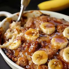 a white bowl filled with banana bread pudding