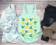 Summer Cotton Tops With Plant Print, Cotton Tops With Plant Print For Summer, Green Tops With Plant Print For Spring, Casual Lemon Print Tops For Spring, Summer Lemon Print Crew Neck Top, Spring Cotton T-shirt With Lemon Print, Cotton T-shirt With Lemon Print For Spring, Yellow Plant Print Summer Top, Spring Lemon Print Cotton Top