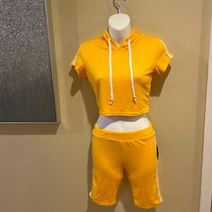 2-Pc Set: Biker Shorts W/Hooded Crop Top. Size Medium, Golden Yellow W/White Stripes On Side. Tags Still Attached. Brand New, Never Worn. Casual Yellow Fitted Biker Shorts, Casual Fitted Yellow Biker Shorts, Sporty Yellow Biker Shorts, Lululemon Biker Shorts, Biker Baby, Hooded Crop Top, Bicycle Shorts, Red Pocket, Baby Shorts