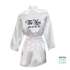 a white robe with the name mrs fleming on it