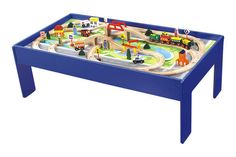 a toy train table with cars and trucks on it's top, sitting in front of a white background