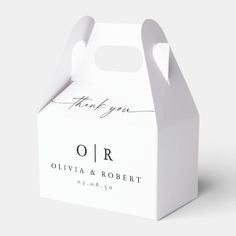 a white box with the words thank you and an or written in cursive writing