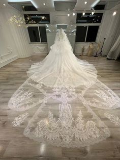 a wedding dress on display in a room