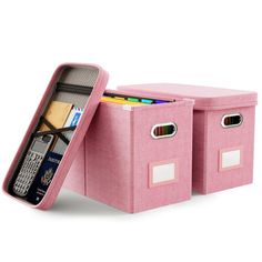 two pink storage bins with dividers on each side, one holding pens and pencils