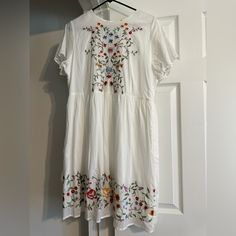 Beautiful White Embroidered Dress. Zips In The Back And Fully Lined. New With Tags Casual Dress With Multicolor Embroidered Hem, Casual Dress With Multicolor Embroidery And Embroidered Hem, Short Sleeve Embroidered Dress For Brunch, Casual Embroidered Dress With Floral Print For Brunch, Casual White Embroidered Dress With Floral Print, Casual Embroidered Dress With Floral Print, Spring Dresses With Multicolor Embroidery, Casual Dresses With Geometric Embroidery For Spring, White Short Sleeve Dress With Floral Embroidery