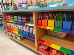 the shelves are filled with different types of crafting supplies and crafts for kids to make