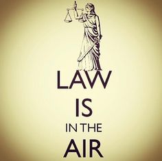 law is in the air with an image of a lady justice statue holding a scale