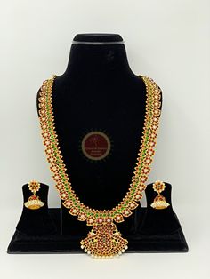 Original Design by Classical Dance Jewelry® -- Colorful And Designer Beautiful Necklace Set For Women. -- You Can Wear this Necklace Set In Parties, Engagement, Weddings, Birthdays, Bharatnatyam And Kuchipudi Dance Performances. -- Handmade Indian Item. -- Size 14 inchs long approxiamately ❇️ Imitation Jewelry by nature is little soft compared to real jewelry so little shape variations and dents could happen during shipping even after taking complete care in packing ❇️ Imitation Jewelry items by Temple Jewelry Sets With Latkans For Festivals, Festive Temple Jewelry With Dori Work, Multicolor Temple Jewelry Sets For Puja, Traditional Temple Necklace With Cutdana For Celebration, Tilla Temple Necklace For Diwali Celebration, Temple Necklace For Diwali Celebration With Tilla, Temple Jewelry Necklace With Cutdana For Celebration, Diwali Celebration Temple Necklace With Cutdana, Festive Cutdana Temple Necklace For Celebrations