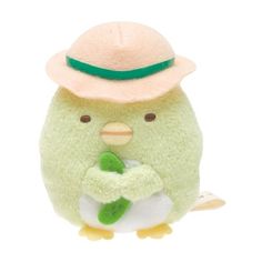 a small stuffed animal with a hat on it's head and hands in the other hand