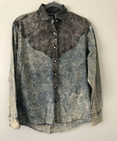 Wranglers Vintage 80’s Women’s Snap Button Denim Blouse Blue Acid Medium NEW. Shipped with USPS First Class Package. Measurements were taken laying flat down •Length 30” •Pit to pit 20” •Shoulder to shoulder 18” •Sleeve 23” Comes from smoke and pet free home !!!! Denim Blouse, Blue Blouse, Snap Button, Denim Button Up, Button Up Shirts, Pet, Blue